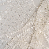 Ivory Cutwork Beaded Tulle — featuring hand-beading and sequins, 100% nylon, 140cm wide