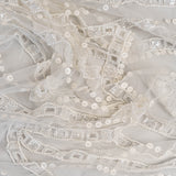 Ivory Cutwork Beaded Tulle — featuring hand-beading and sequins, 100% nylon, 140cm wide