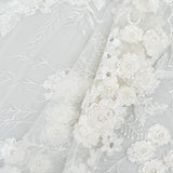 Ivory Embroidered 3D Tulle — featuring floral motifs, a 3D floral design and hand-beading, 50% nylon 50% rayon, 140cm wide
