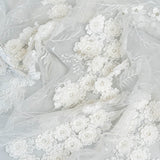 Ivory Embroidered 3D Tulle — featuring floral motifs, a 3D floral design and hand-beading, 50% nylon 50% rayon, 140cm wide