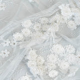 Ivory Embroidered 3D Tulle — featuring floral motifs, a 3D floral design and hand-beading, 50% nylon 50% rayon, 140cm wide