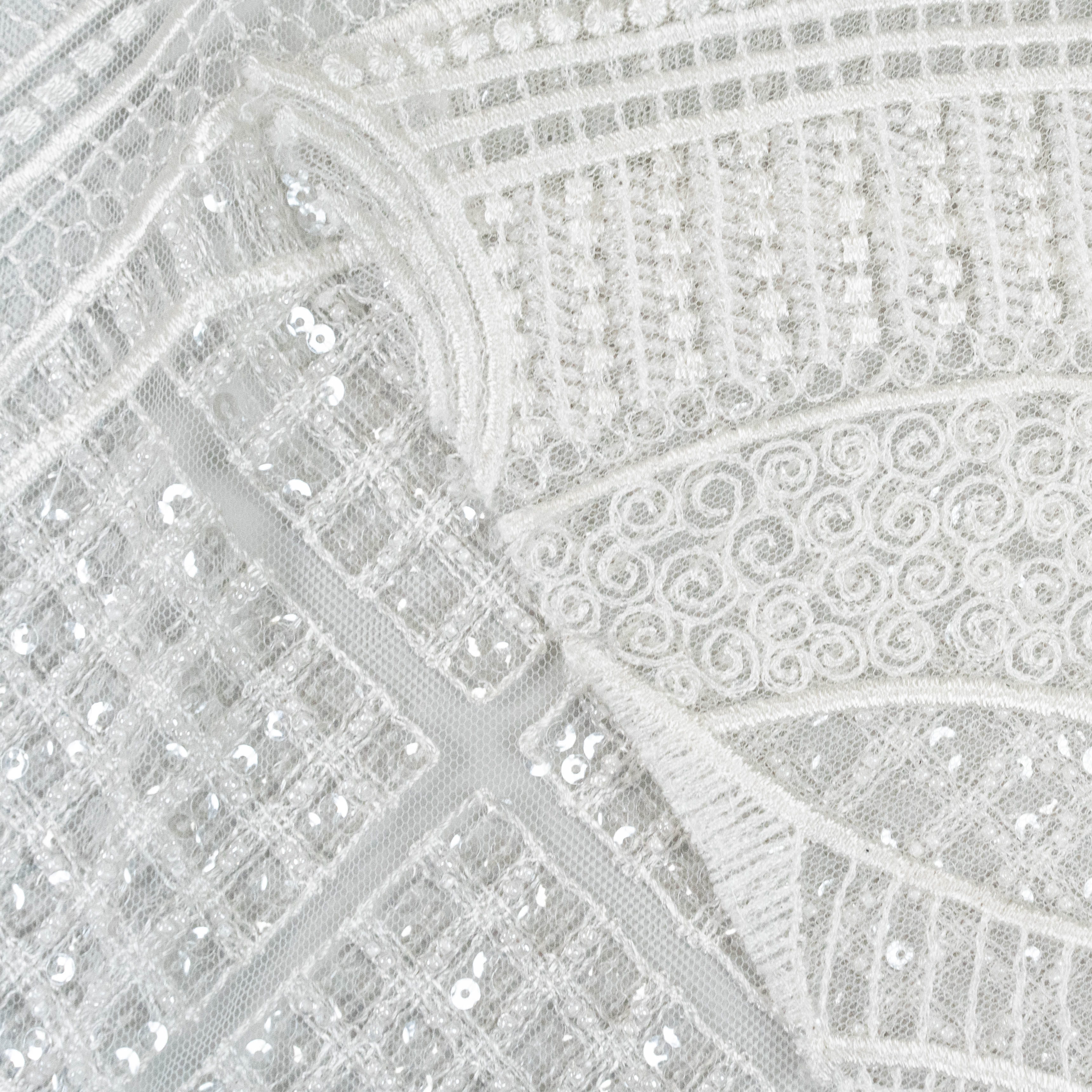 Ivory Embellished Tulle — featuring scalloped edges and hand-beading, 50% nylon 50% rayon, 130cm wide