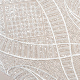 Ivory Embellished Tulle — featuring scalloped edges and hand-beading, 50% nylon 50% rayon, 130cm wide
