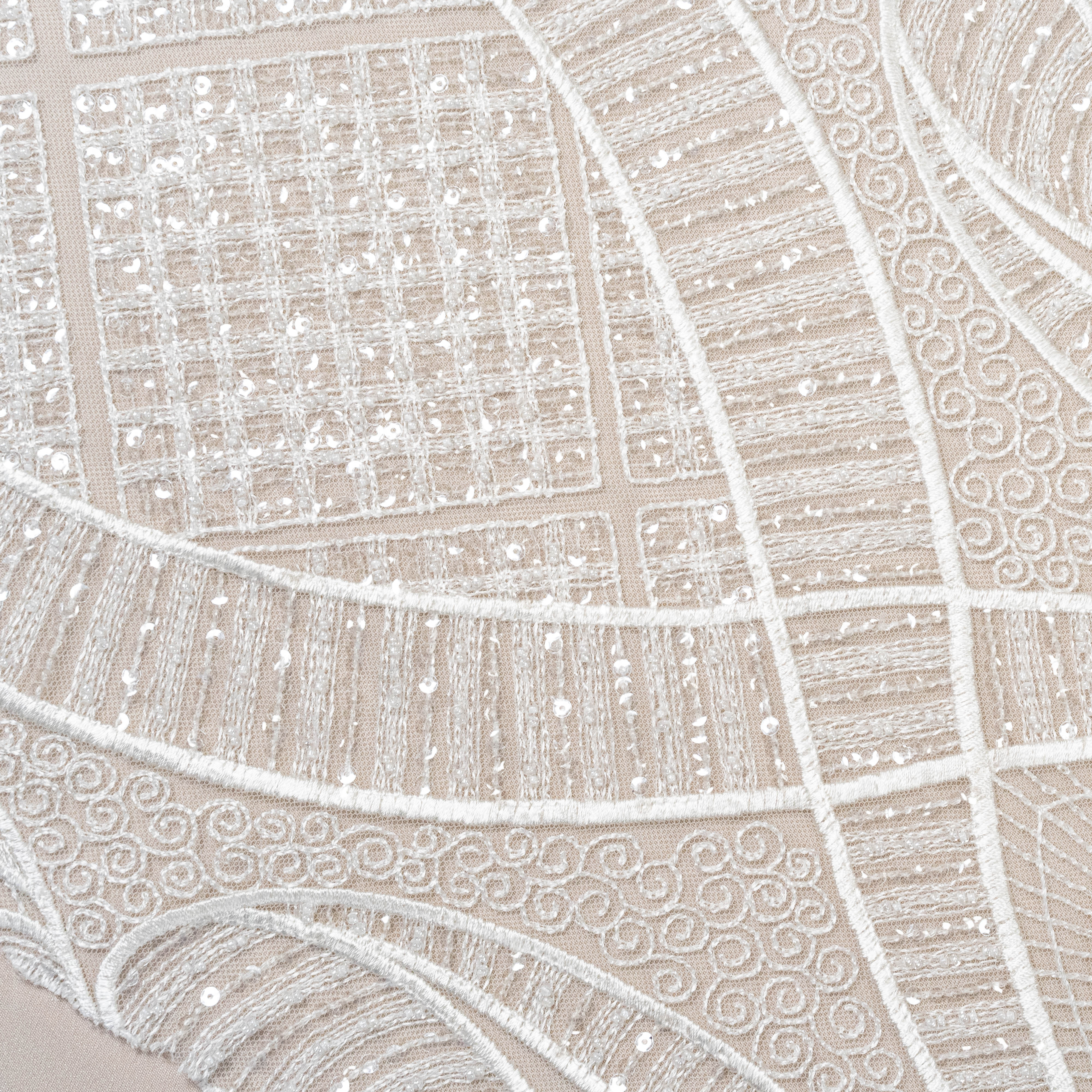 Ivory Embellished Tulle — featuring scalloped edges and hand-beading, 50% nylon 50% rayon, 130cm wide