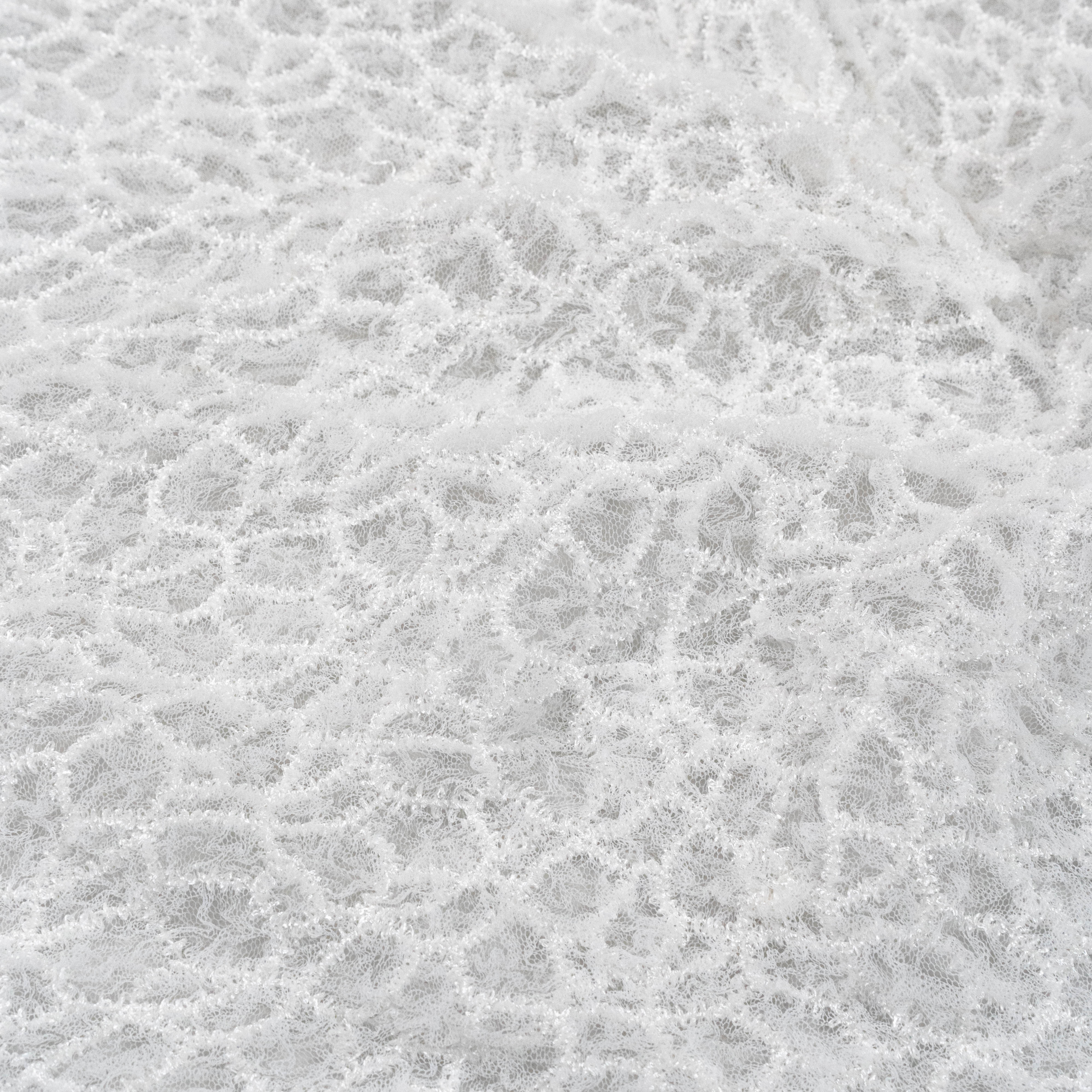 Off White Elastic Crushed Tulle — featuring a crushed texture, 100% nylon, 50cm wide