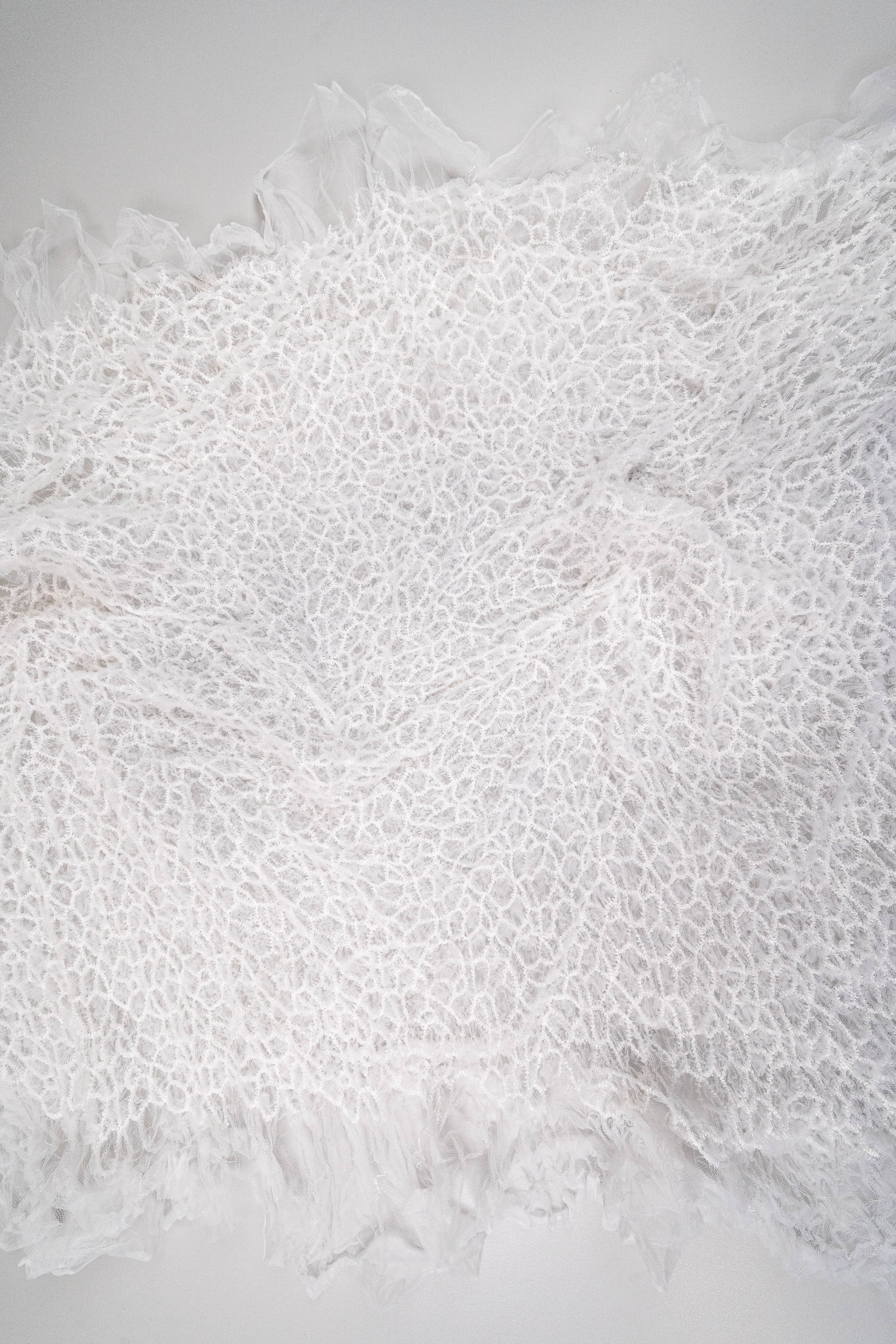Off White Elastic Crushed Tulle — featuring a crushed texture, 100% nylon, 50cm wide