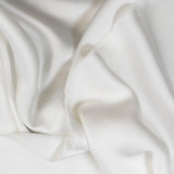 Ivory Faux Acetate Satin — mid-weight double-faced polyester satin with a delustered finish, fluid drape and slight stretch