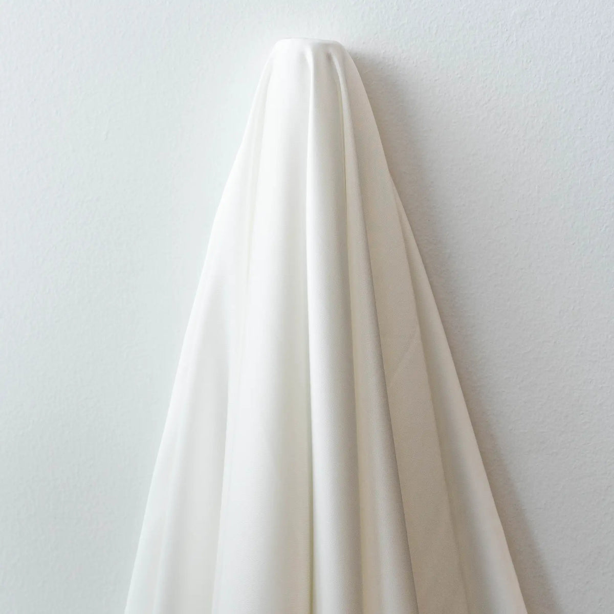 Ivory Faux Acetate Satin — mid-weight double-faced polyester satin with a delustered finish, fluid drape and slight stretch