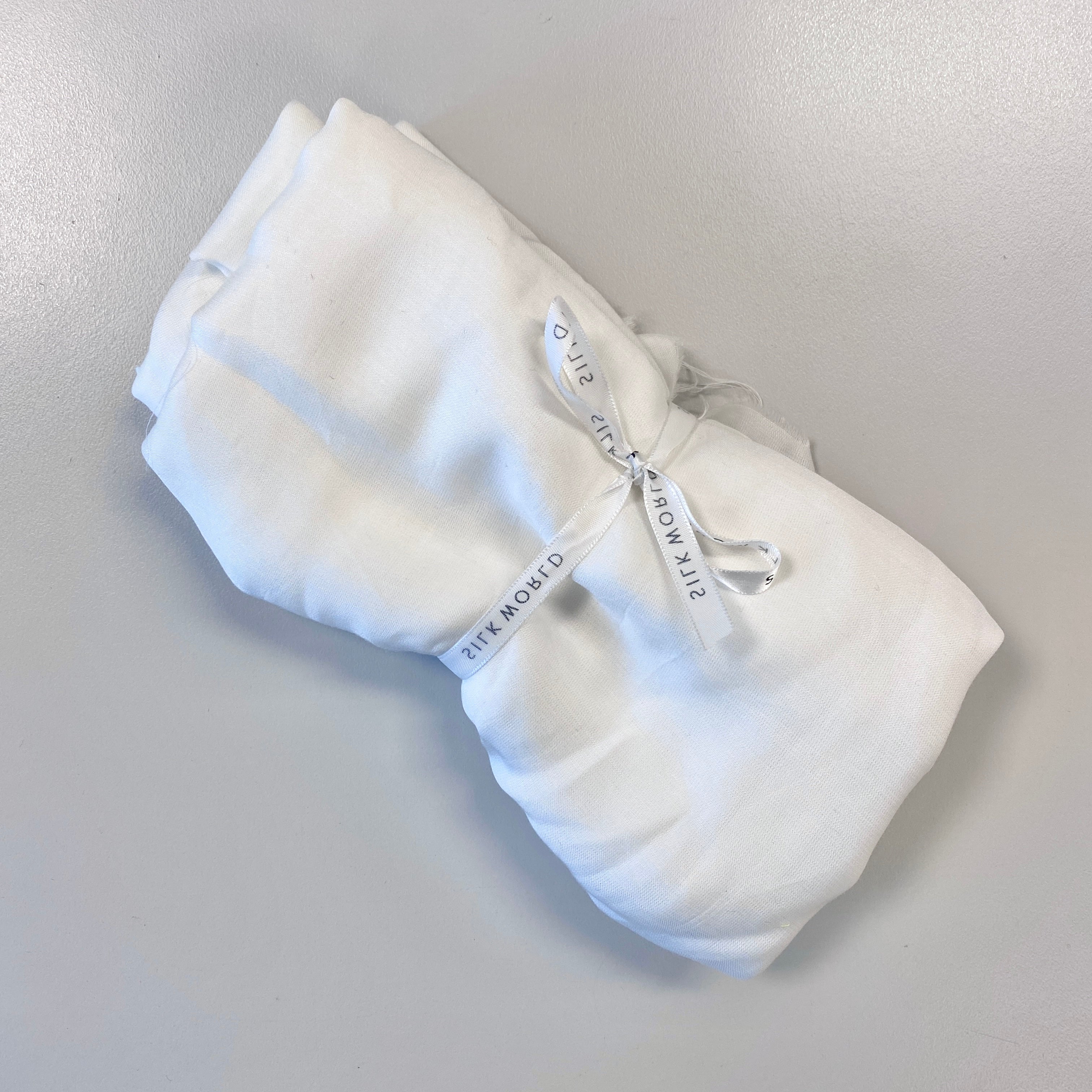 Remnant Rose Petal Satin - Ivory