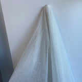 Off White / Silver Glitter Tulle — lightweight and soft, 100% nylon, 150cm wide