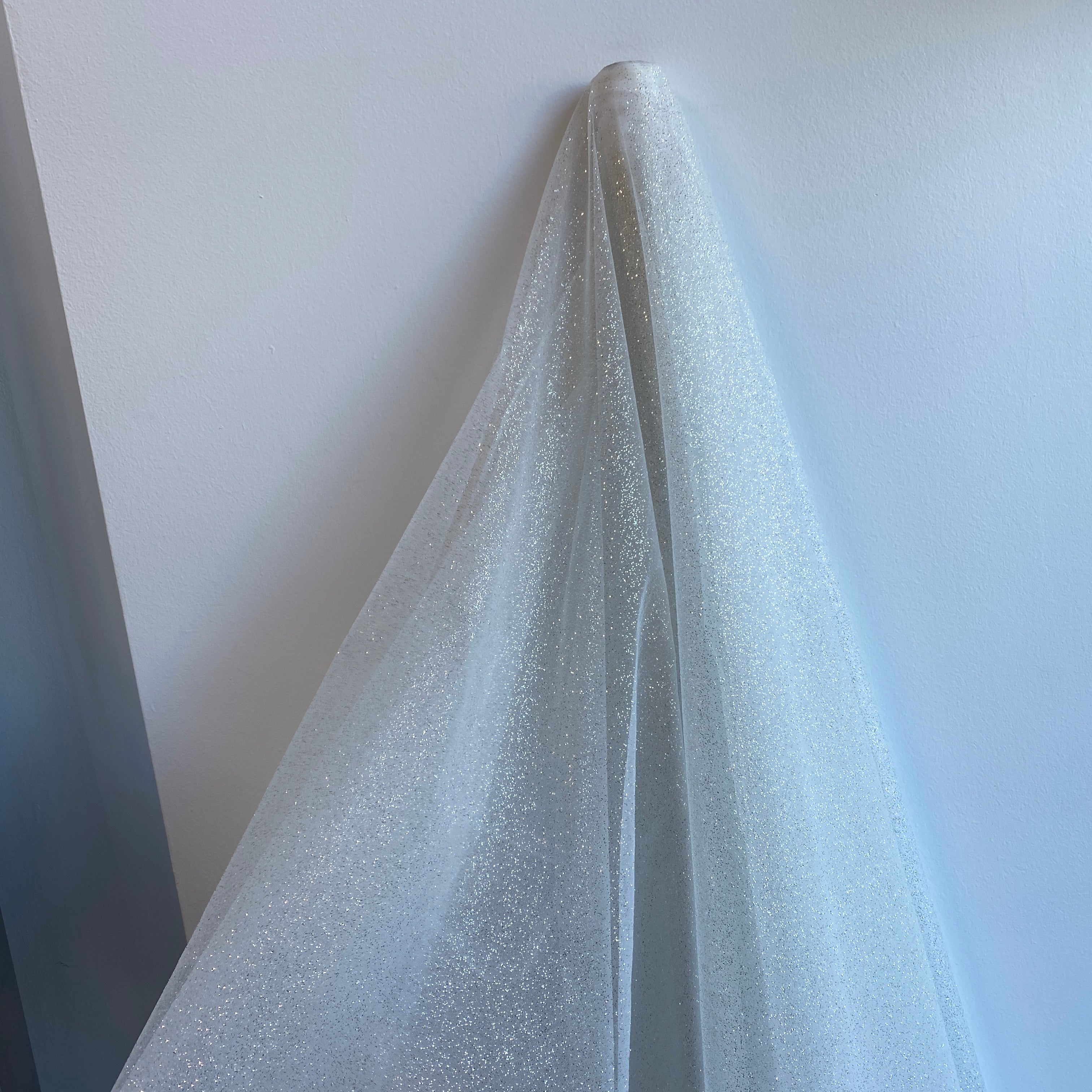 Off White / Silver Glitter Tulle — lightweight and soft, 100% nylon, 150cm wide