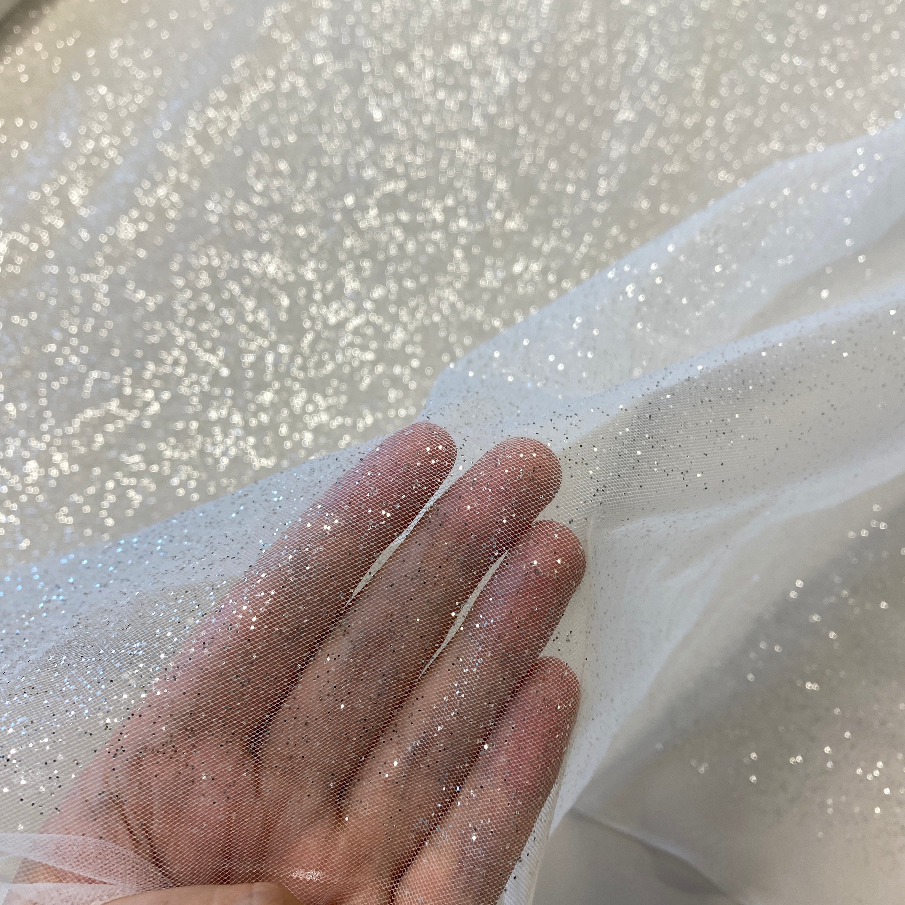 Off White / Silver Glitter Tulle — lightweight and soft, 100% nylon, 150cm wide
