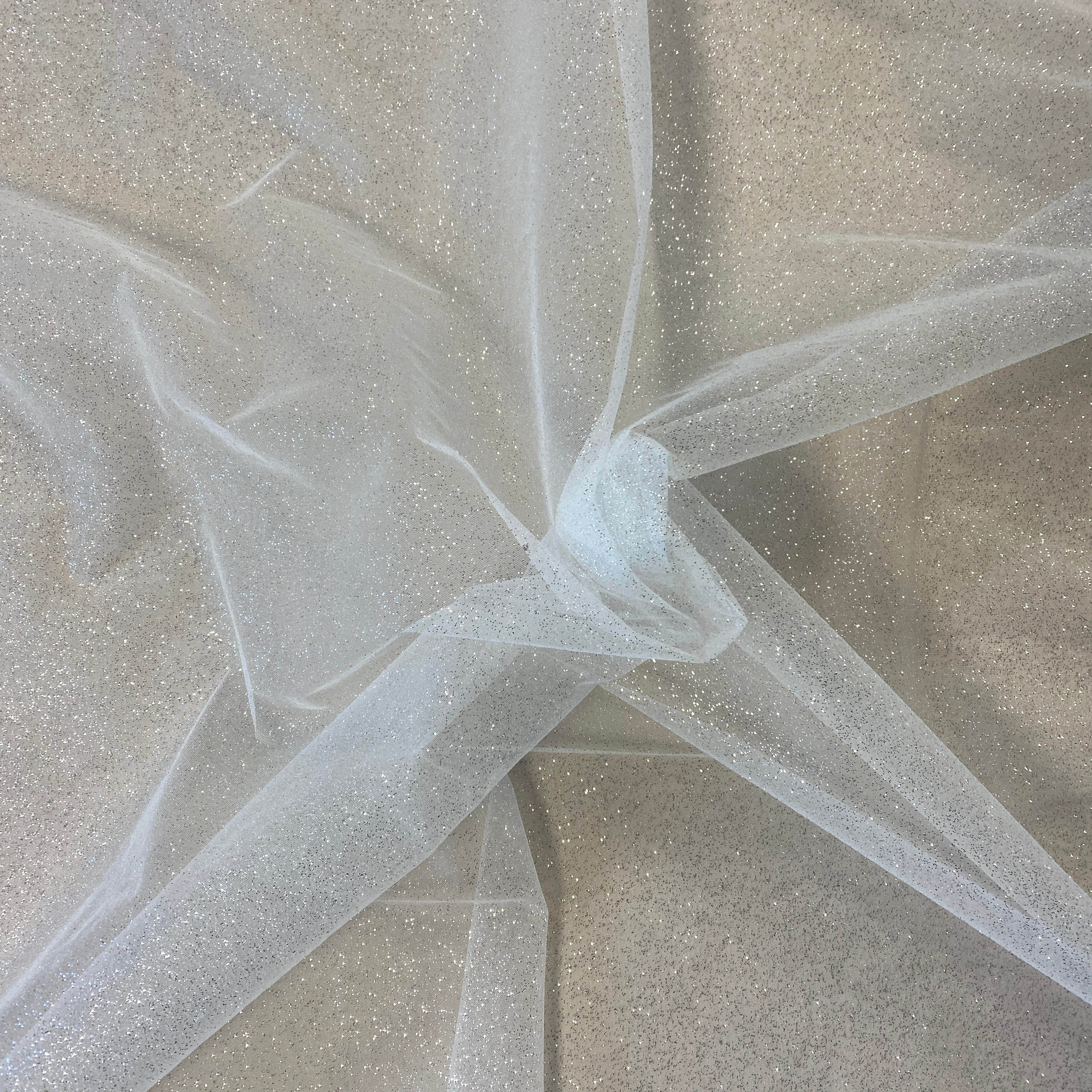 Off White / Silver Glitter Tulle — lightweight and soft, 100% nylon, 150cm wide