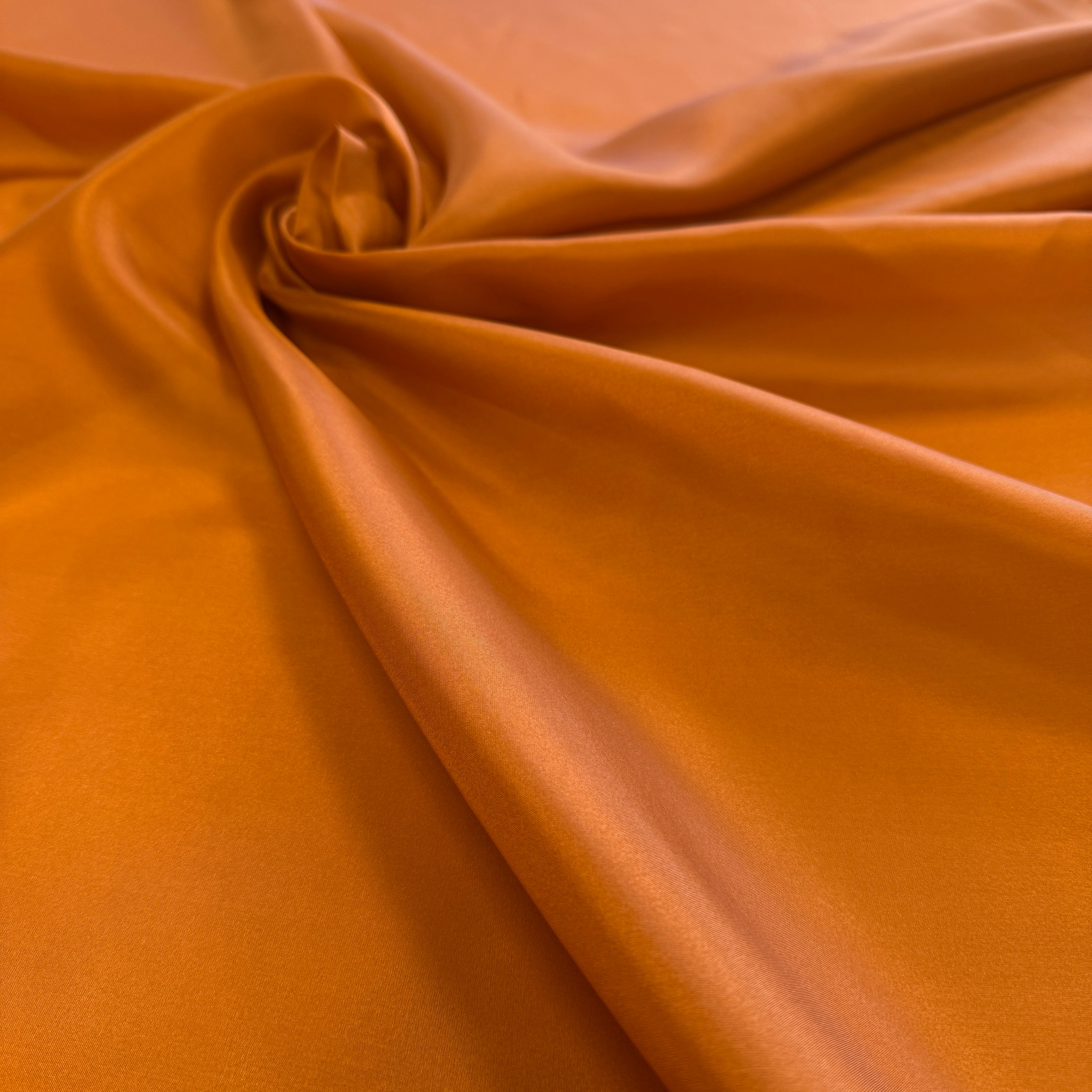 Burnt Orange Habotai — soft with a light, airy drape and a smooth satin finish, 100% mulberry silk, 140cm wide
