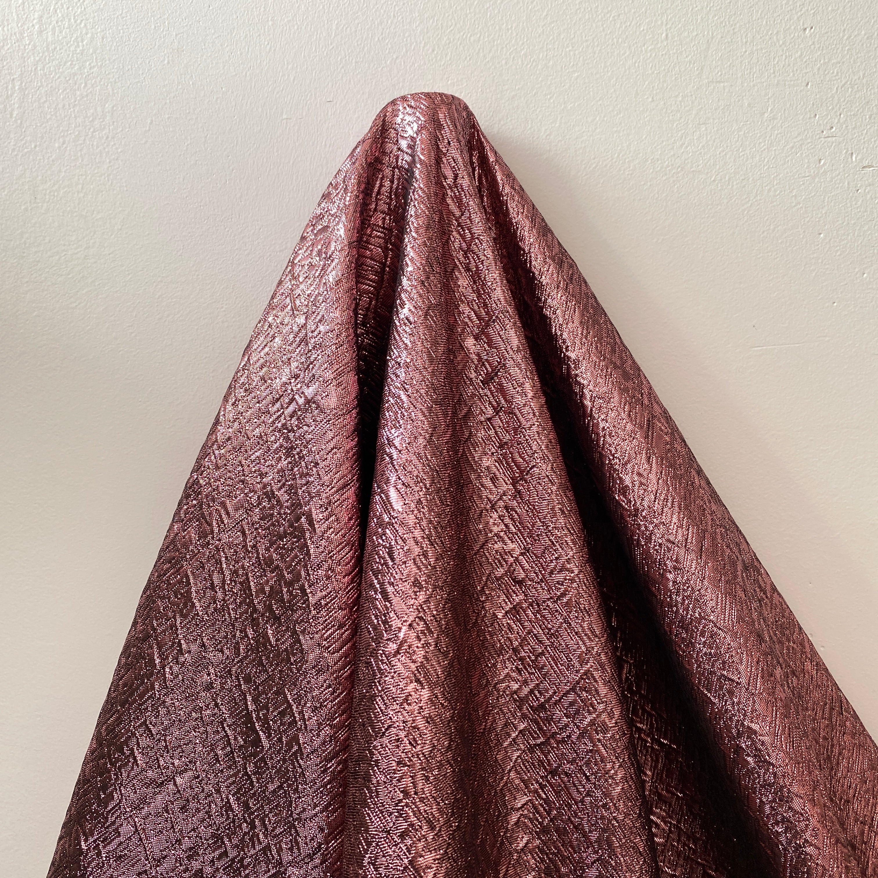 Rose Pink Metallic Jacquard — featuring a woven metallic jacquard design with a soft feel and stiff drape, 140cm wide