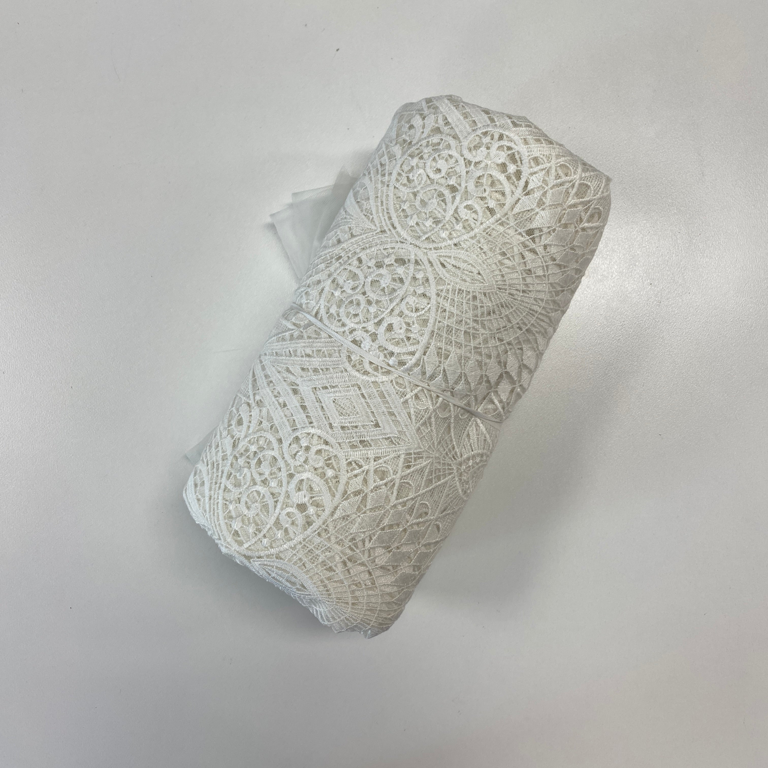 Ivory Embroidered Ornamental Tulle — featuring art deco motifs, 60% nylon 40% polyester, 130cm wide
