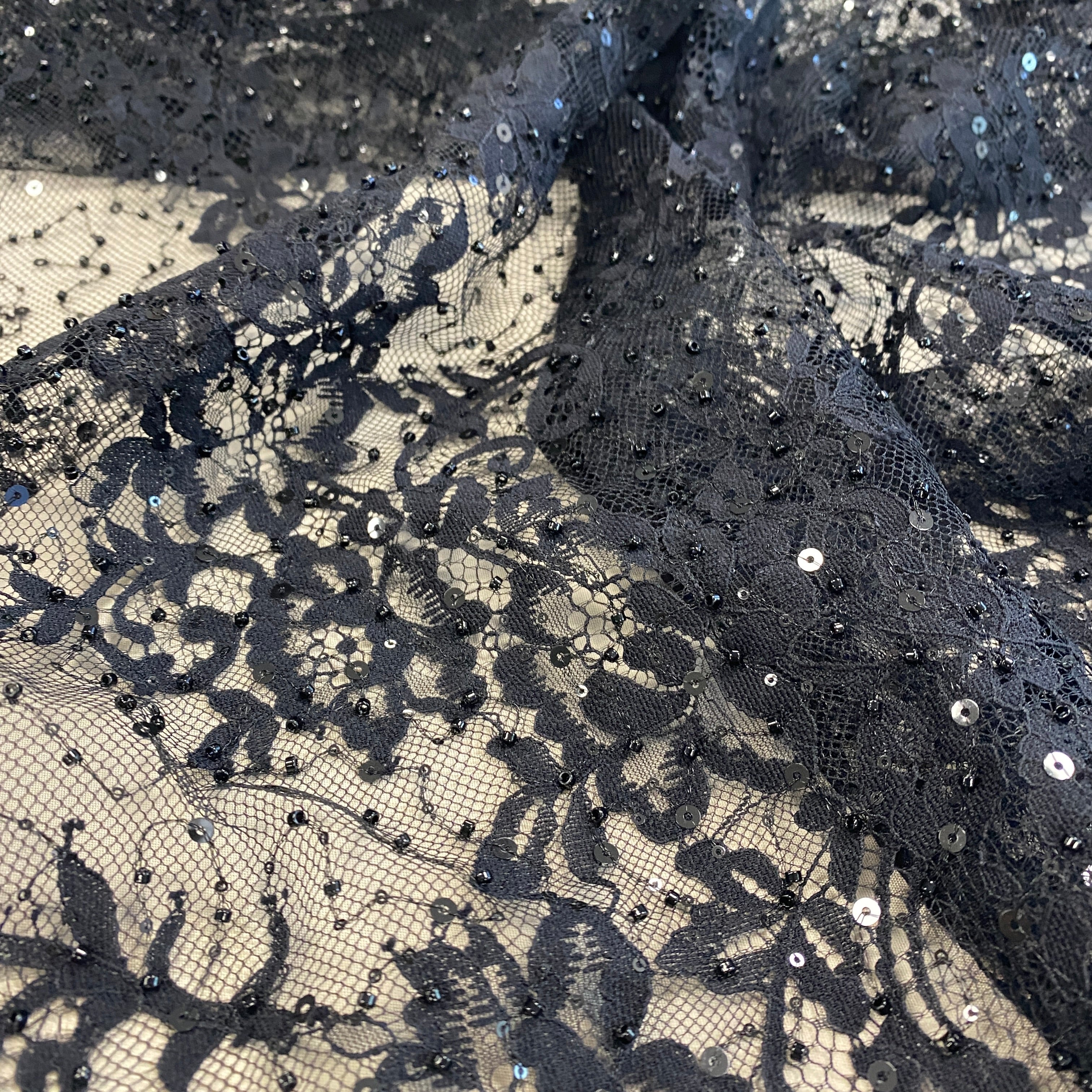 Black Beaded Fine Lace — featuring scalloped edges, eyelash detail and floral motifs, in nylon and viscose, 130cm wide