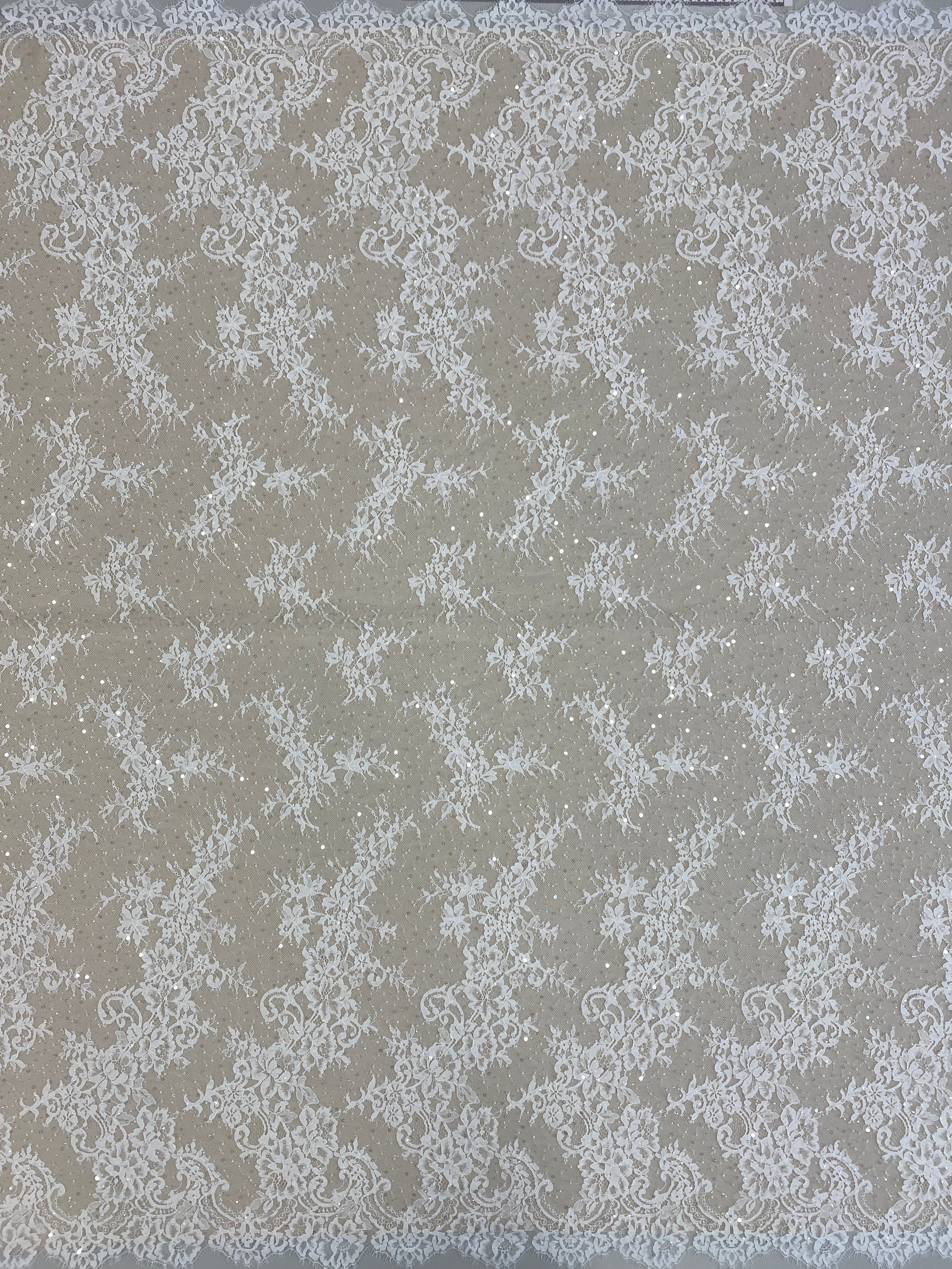 Ivory Beaded Fine Lace — featuring scalloped edges, eyelash detail and floral motifs, in nylon and viscose, 130cm wide