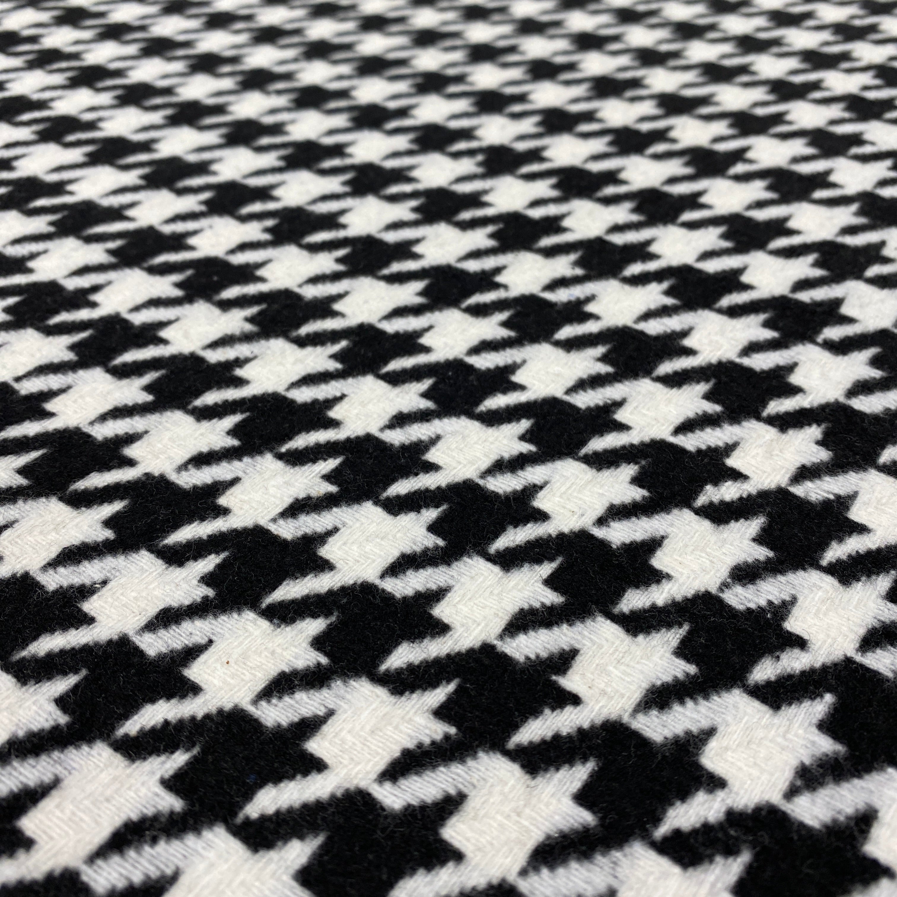 White Italian Wool Tweed — a heavyweight wool-cotton blend tweed with a houndstooth pattern and soft brushed handle, 150cm wide