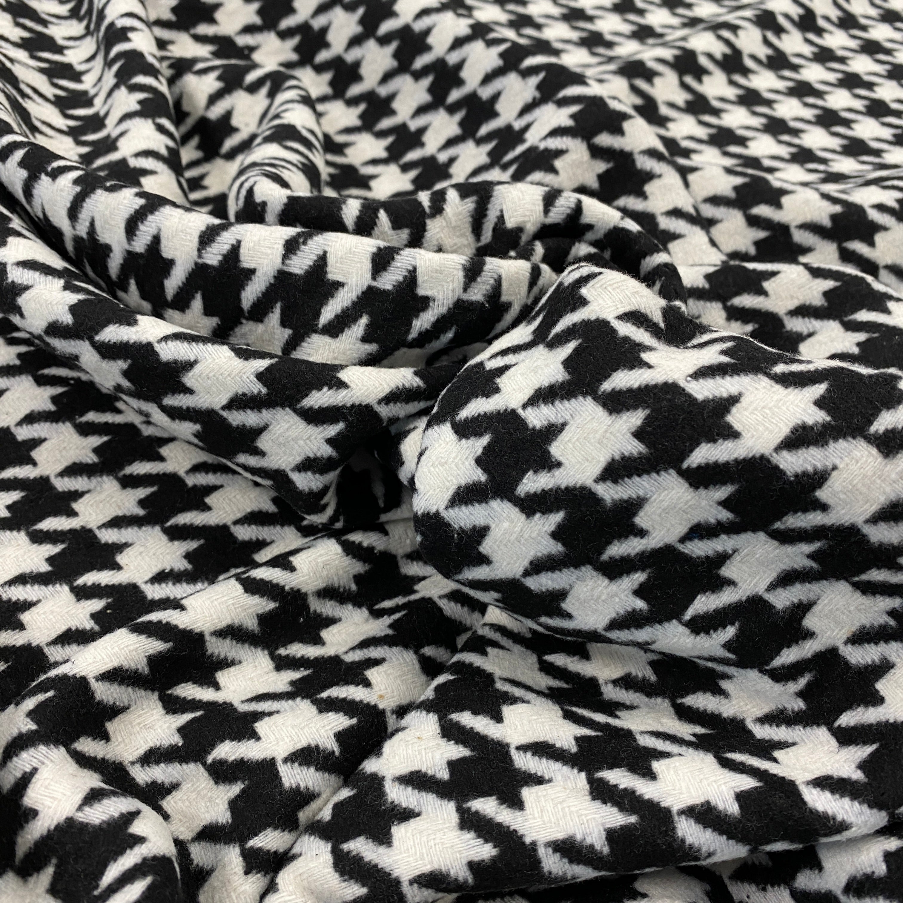 White Italian Wool Tweed — a heavyweight wool-cotton blend tweed with a houndstooth pattern and soft brushed handle, 150cm wide