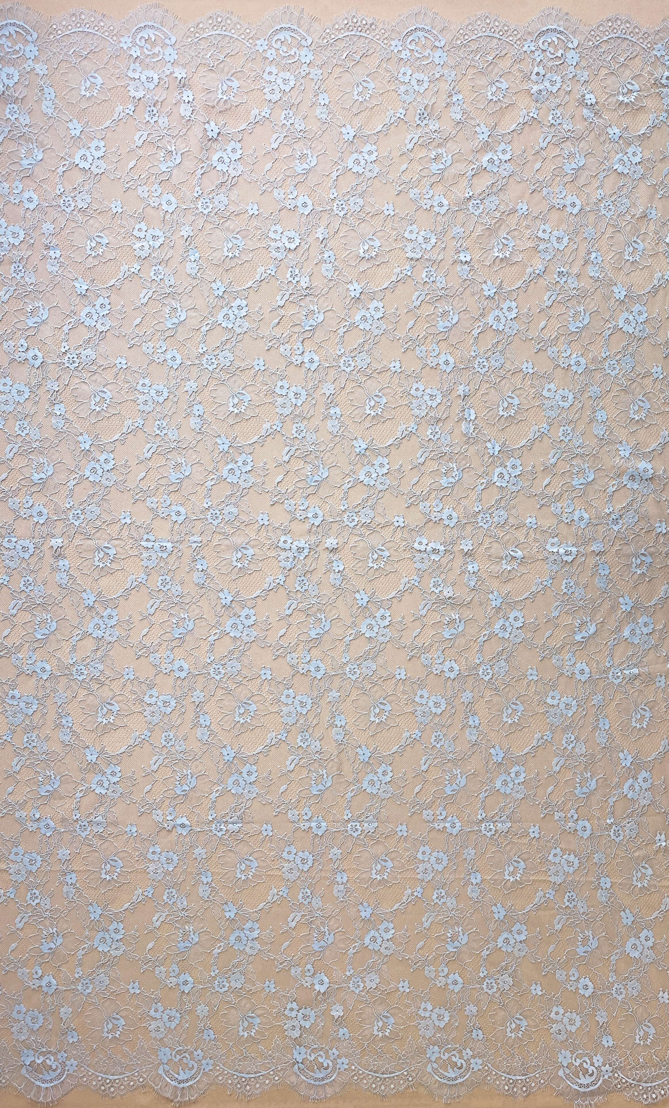 Sky Blue Fine Lace — featuring scalloped edges and floral motifs, in viscose and nylon, 140cm wide