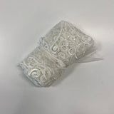 Ivory Embroidered Tulle — featuring scalloped edges and sequins, 30% nylon 30% rayon 40% polyester, 130cm wide