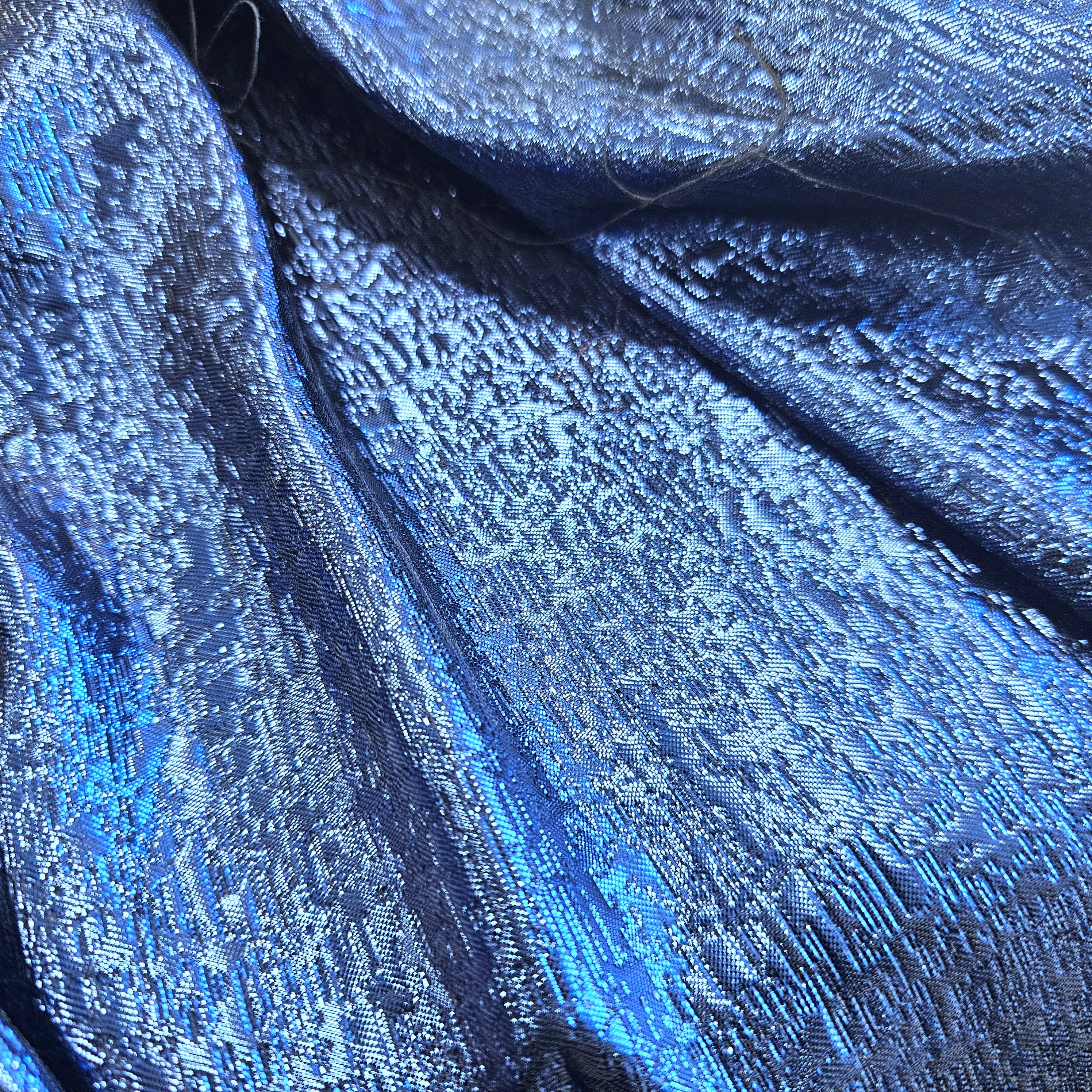 Electric Metallic Jacquard — featuring a woven metallic jacquard design with a soft feel and stiff drape, 140cm wide