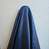 Electric Metallic Jacquard — featuring a woven metallic jacquard design with a soft feel and stiff drape, 140cm wide