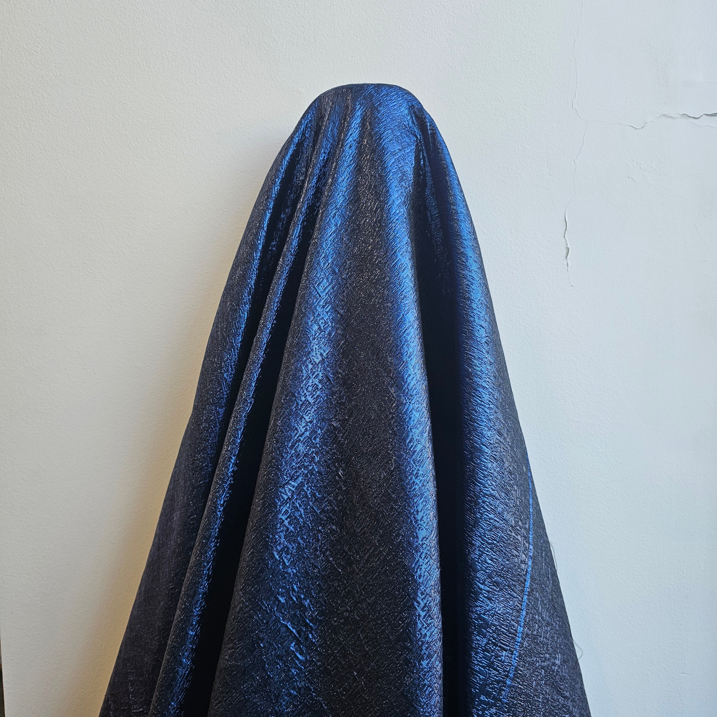 Electric Metallic Jacquard — featuring a woven metallic jacquard design with a soft feel and stiff drape, 140cm wide