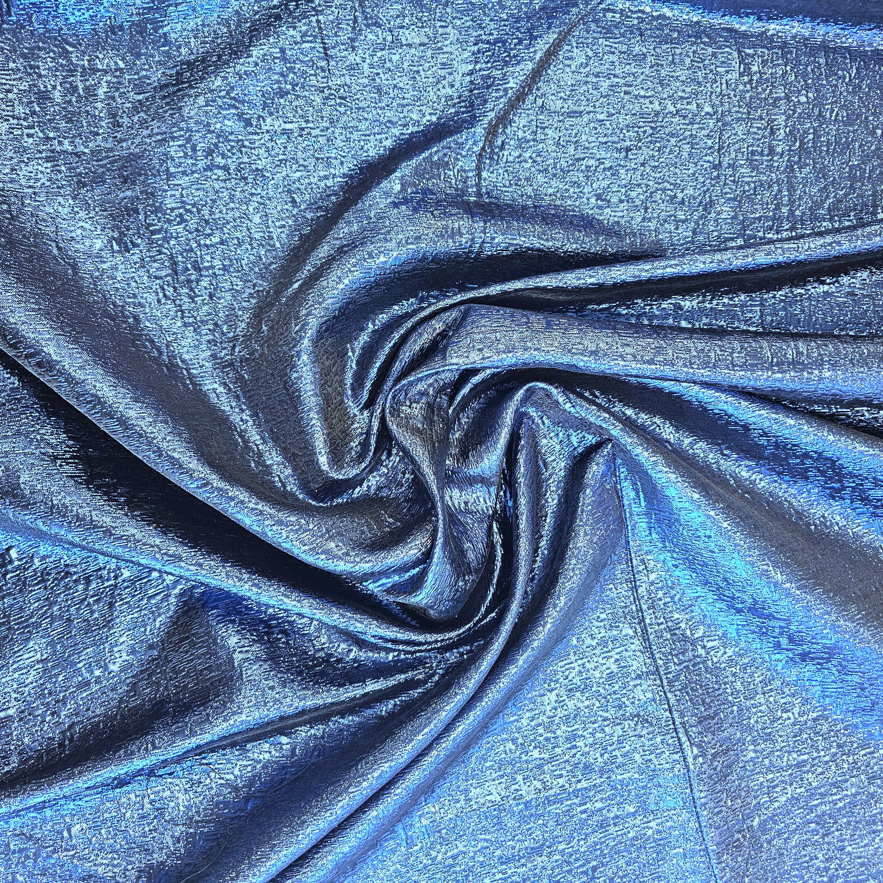 Electric Metallic Jacquard — featuring a woven metallic jacquard design with a soft feel and stiff drape, 140cm wide