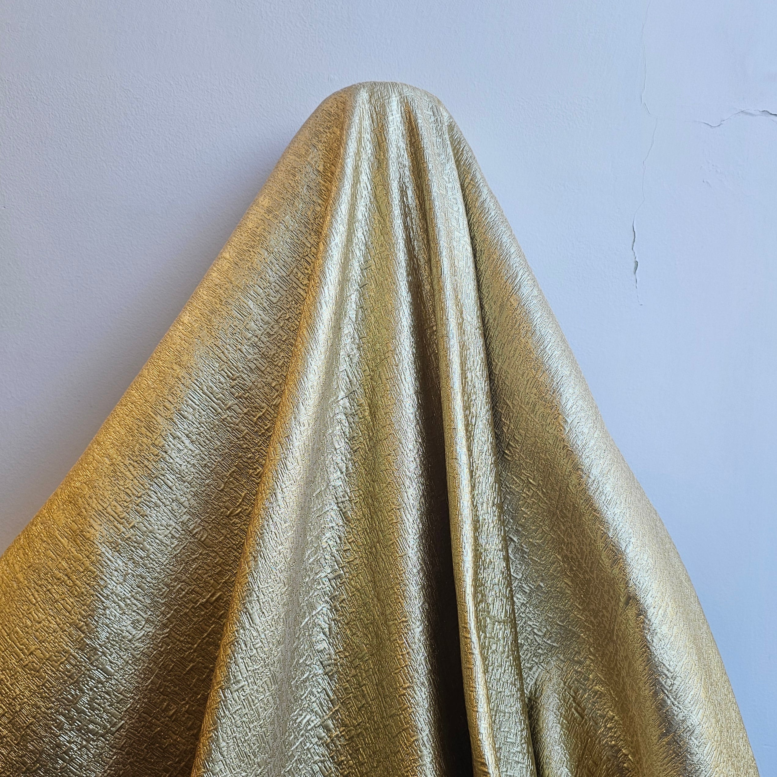 Metallic gold jacquard brocade fabric draped, designer couture fabric for eveningwear dress
