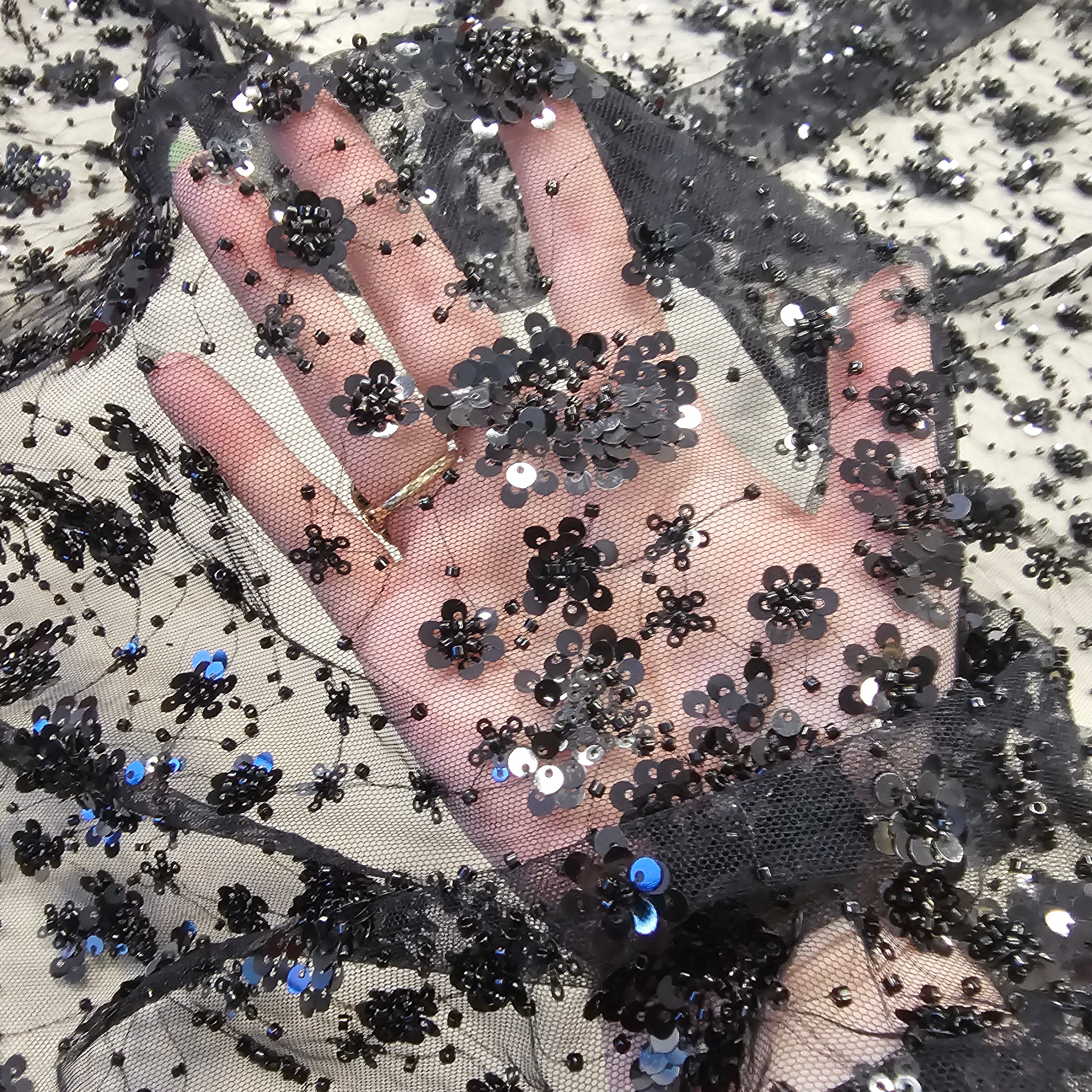 Black Sequin Tulle — featuring hand-beading and sequins, 50% rayon 50% nylon, 130cm wide