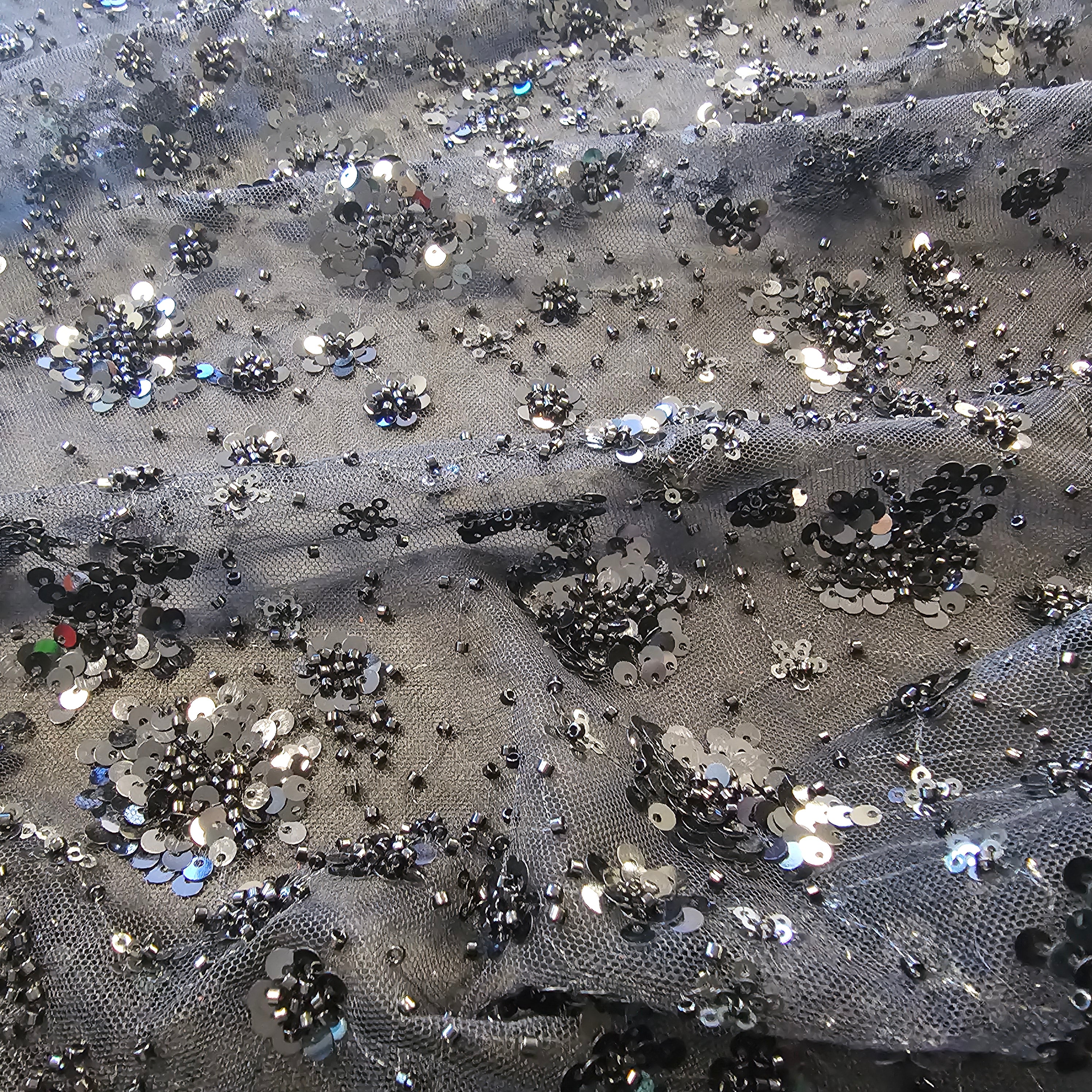Black Sequin Tulle — featuring hand-beading and sequins, 50% rayon 50% nylon, 130cm wide