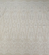 Ivory / Silver Embroidered Corded Tulle — featuring scalloped edges, a corded texture and sequins, 50% nylon 50% rayon, 130cm wide