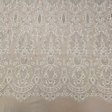 Ivory / Silver Embroidered Corded Tulle — featuring scalloped edges, a corded texture and sequins, 50% nylon 50% rayon, 130cm wide