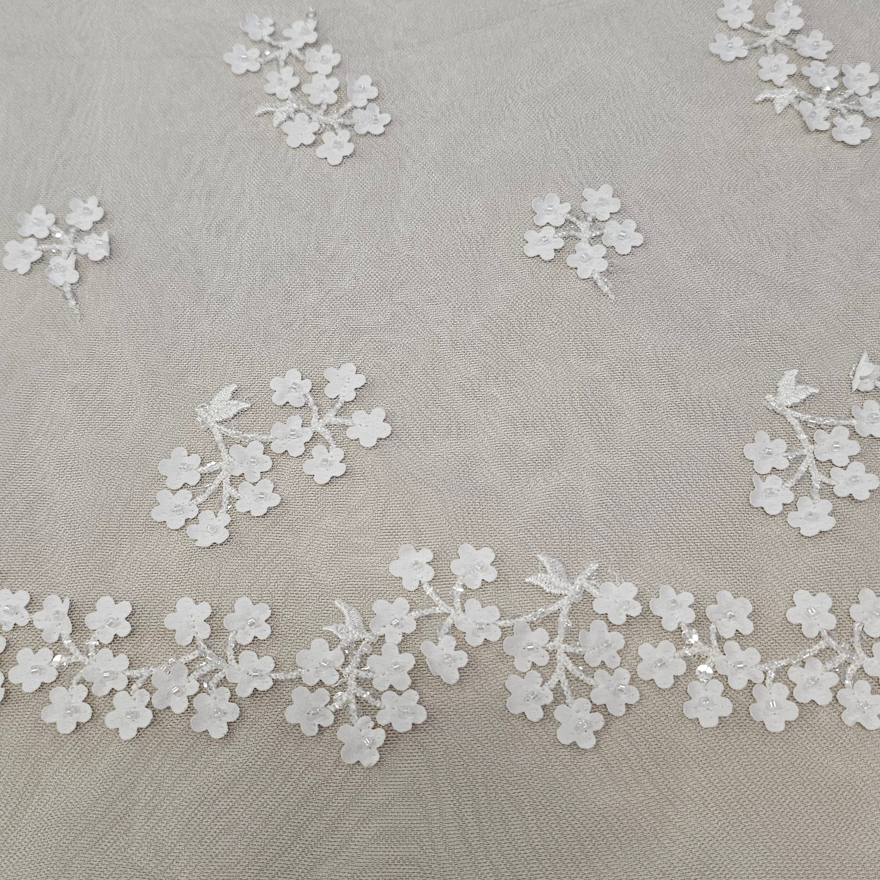 Ivory 3D Floral Tulle — featuring floral motifs, a 3D floral design and a border design, 50% nylon 50% rayon, 130cm wide