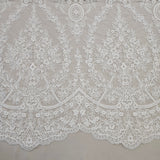 Ivory Embroidered Corded Tulle — featuring scalloped edges and a corded texture, 60% rayon 40% nylon, 130cm wide