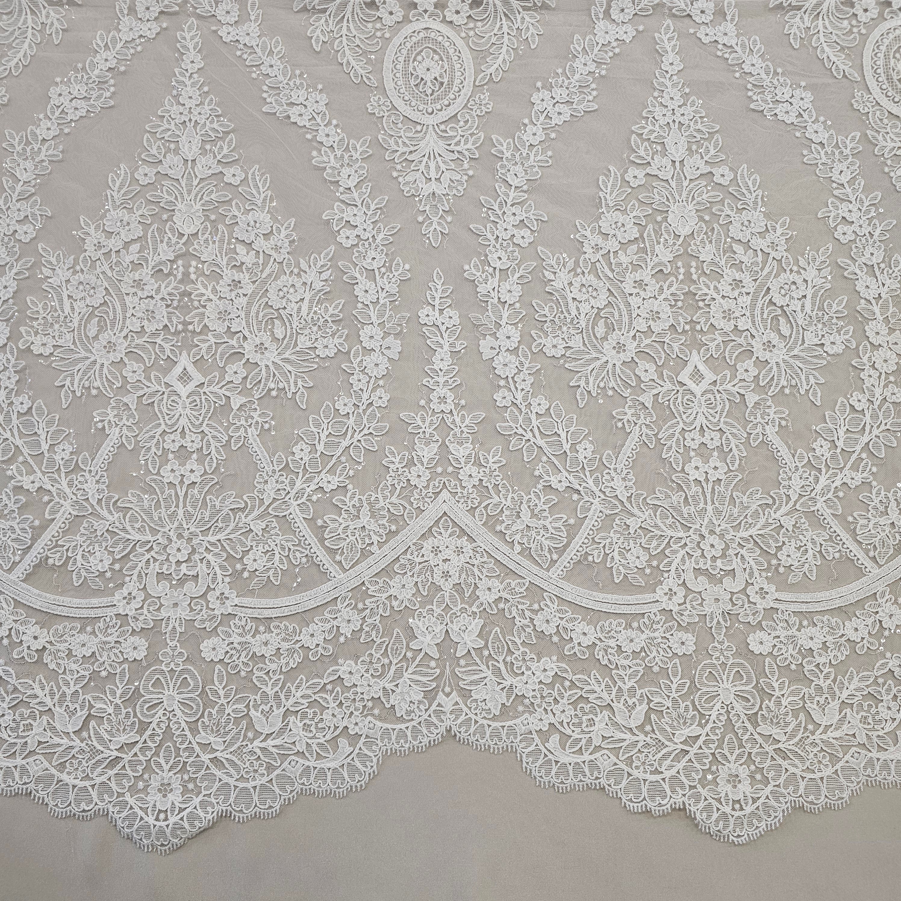Ivory Embroidered Corded Tulle — featuring scalloped edges and a corded texture, 60% rayon 40% nylon, 130cm wide