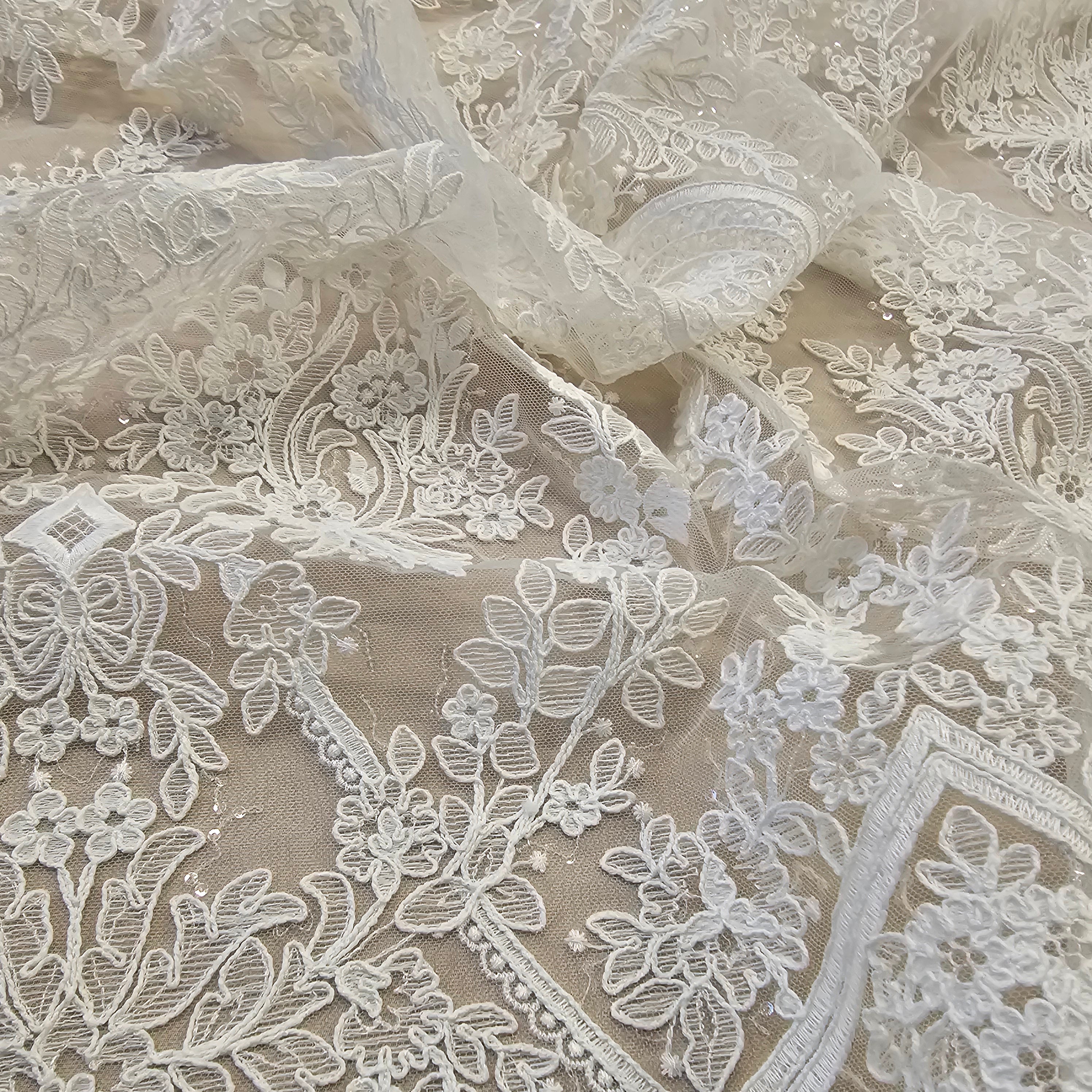 Ivory Embroidered Corded Tulle — featuring scalloped edges and a corded texture, 60% rayon 40% nylon, 130cm wide