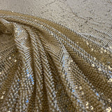 Gold Sequined Tulle — featuring hand-beading and sequins, 50% rayon 50% nylon, 130cm wide