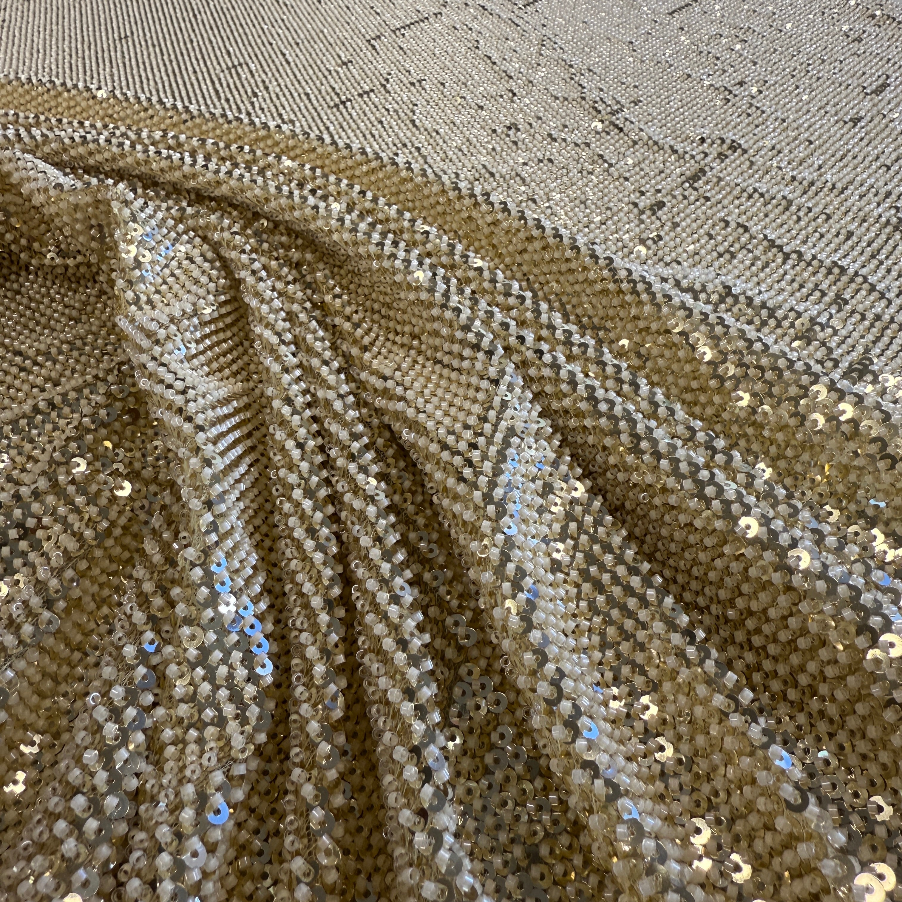 Gold Sequined Tulle — featuring hand-beading and sequins, 50% rayon 50% nylon, 130cm wide