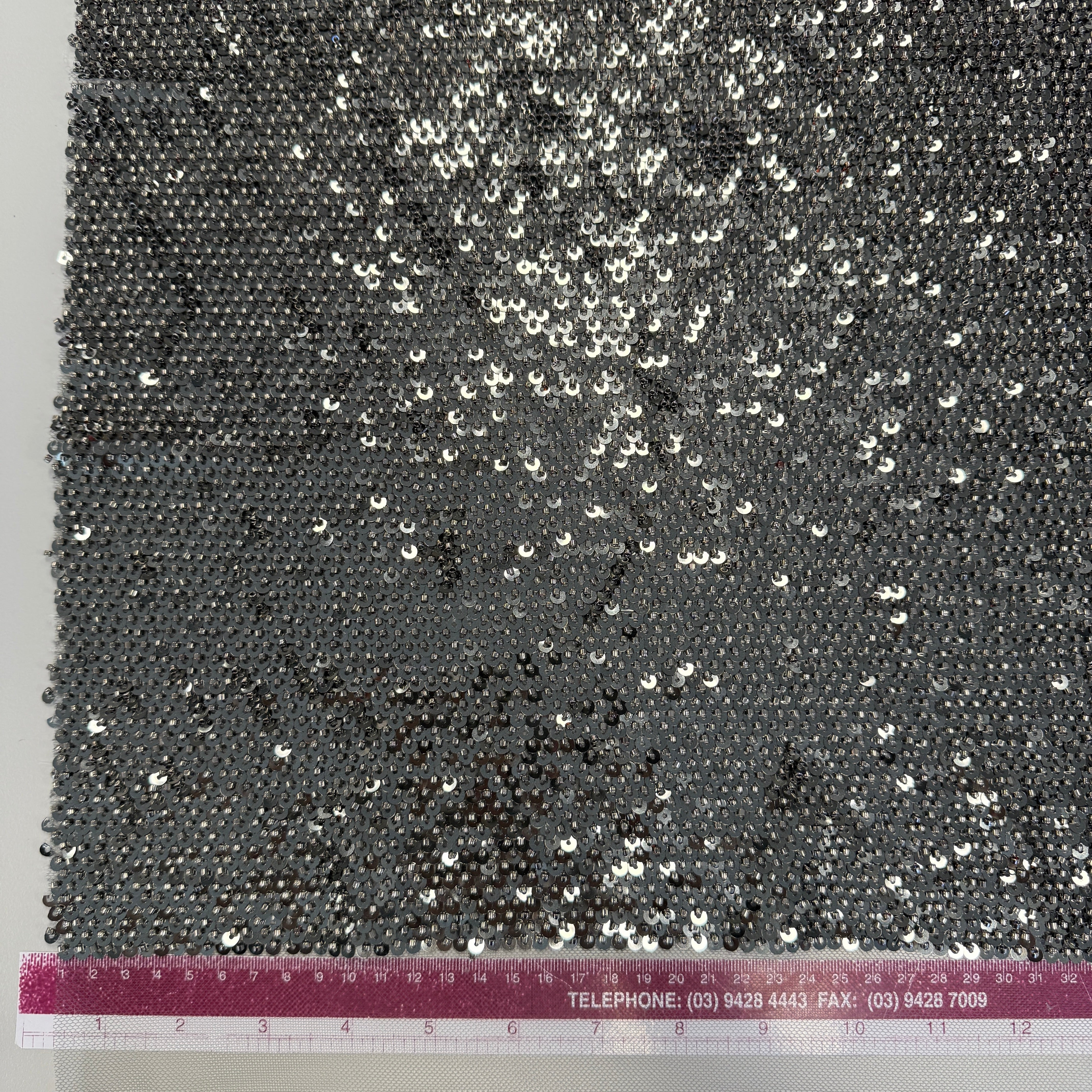Gunmetal Sequined Tulle — featuring hand-beading and sequins, 50% rayon 50% nylon, 130cm wide