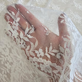 Ivory Fine Floral Lace — featuring scalloped edges, eyelash detail and floral motifs, 130cm wide