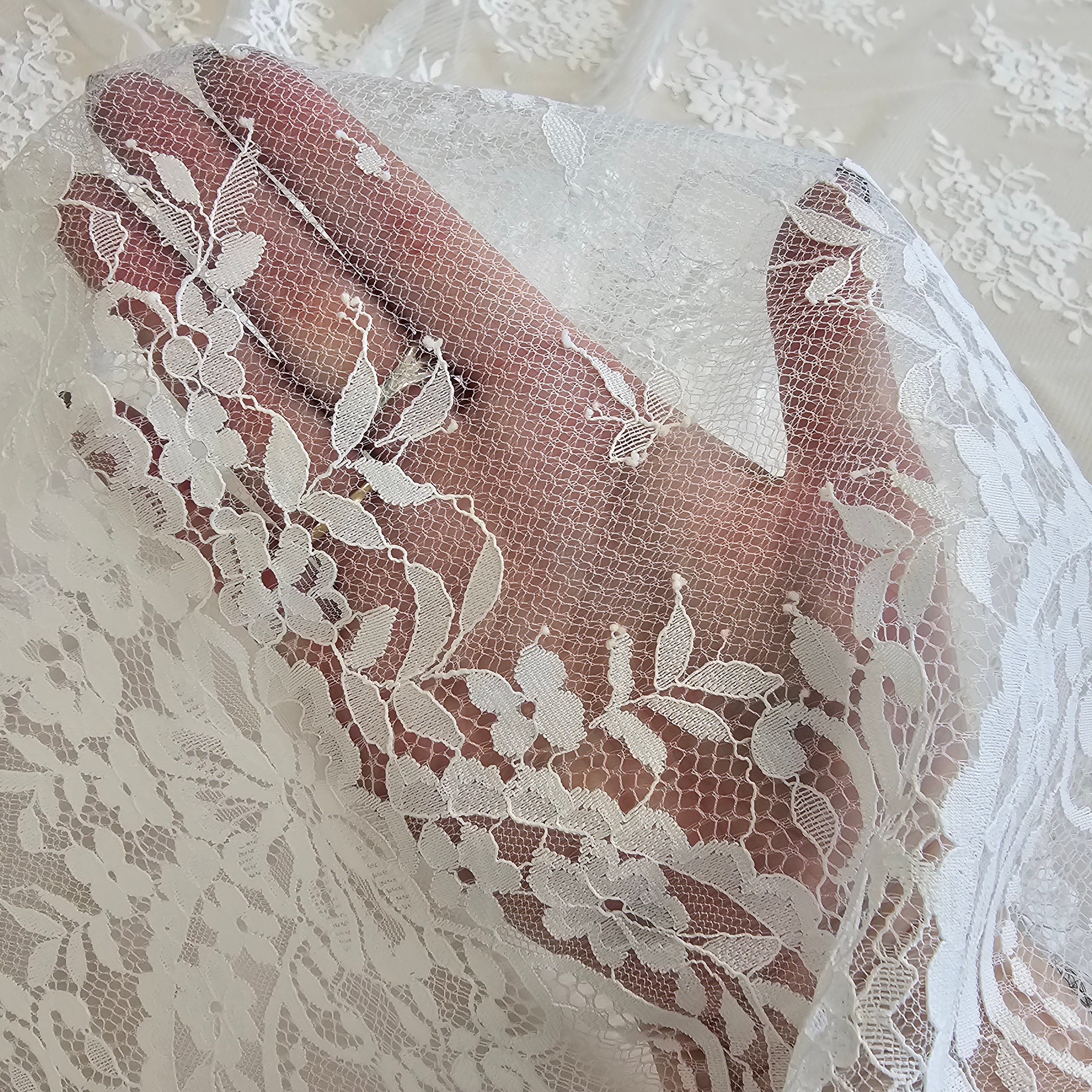 Ivory Fine Floral Lace — featuring scalloped edges, eyelash detail and floral motifs, 130cm wide