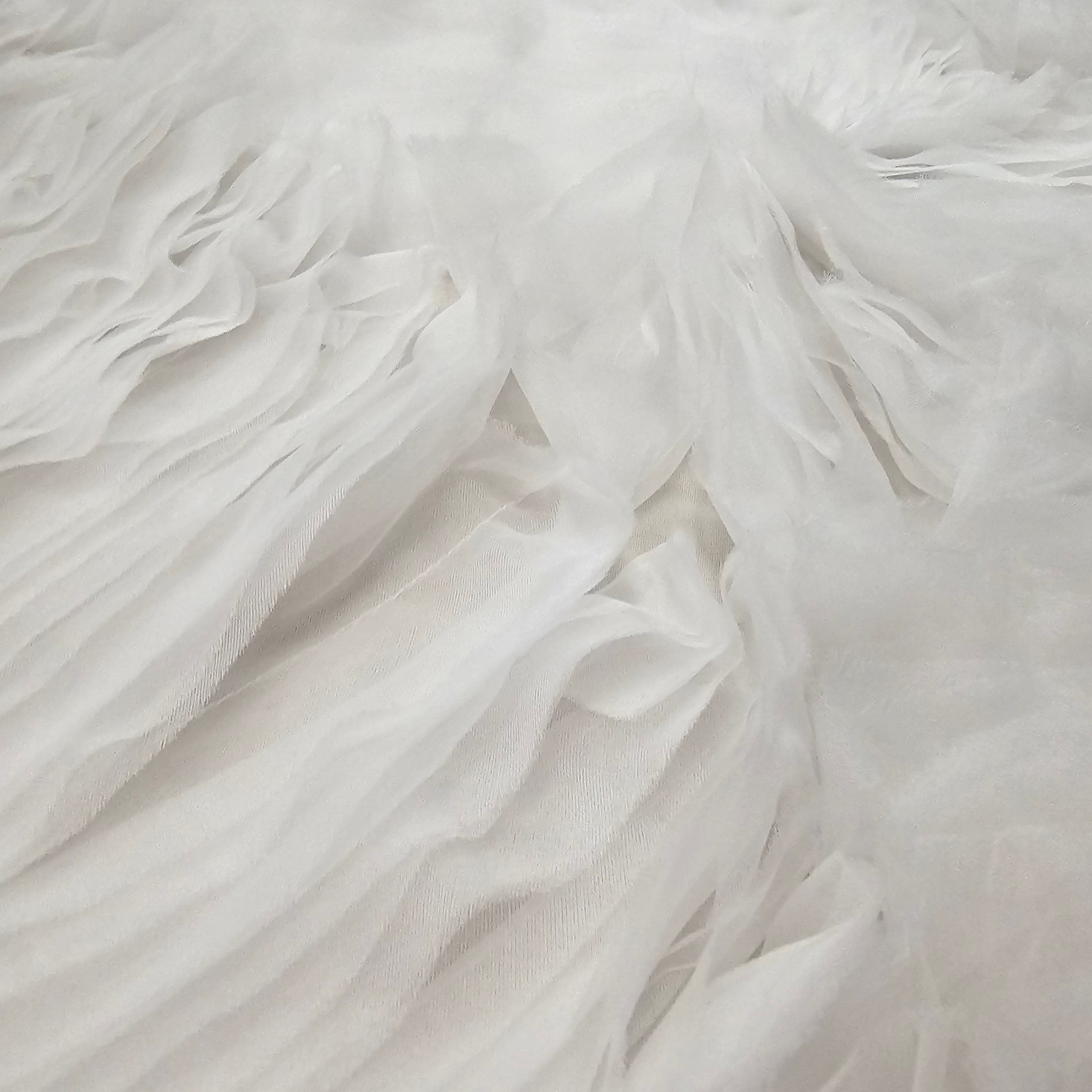 Ivory Organza Ruffle Tulle — featuring geometric motifs, 100% nylon, 140cm wide