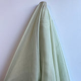 Sage Satin Chiffon — lightweight and sheer with a fluid, airy drape and a smooth satin luster finish, 100% mulberry silk, 140cm wide