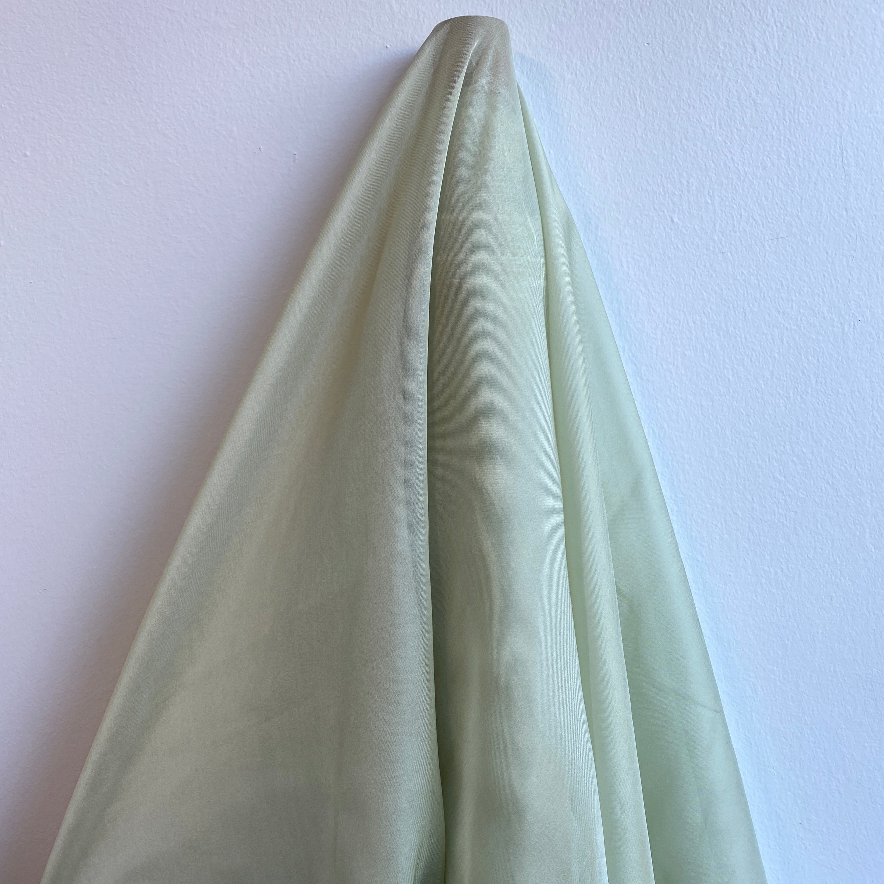 Sage Satin Chiffon — lightweight and sheer with a fluid, airy drape and a smooth satin luster finish, 100% mulberry silk, 140cm wide