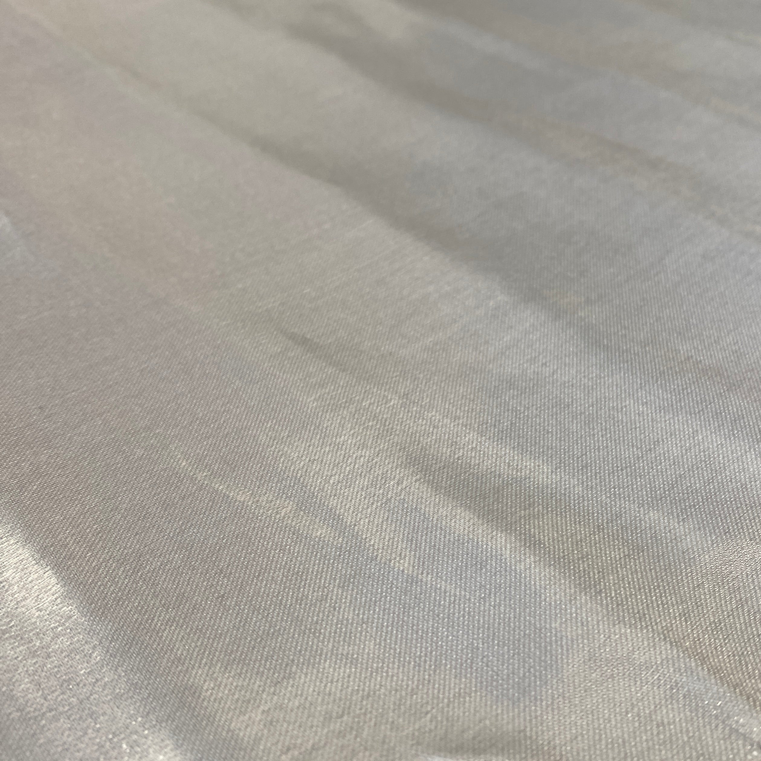 Silver Liquid Satin — smooth and glossy with a liquid, wet-look shimmer, 100% polyester, 150cm wide