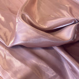Tea Rose Liquid Satin — smooth and glossy with a liquid, wet-look shimmer, 100% polyester, 150cm wide