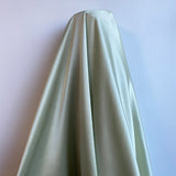 Sage Sandwash Satin — lightweight and soft with a smooth luster satin finish, 100% mulberry silk, 140cm wide